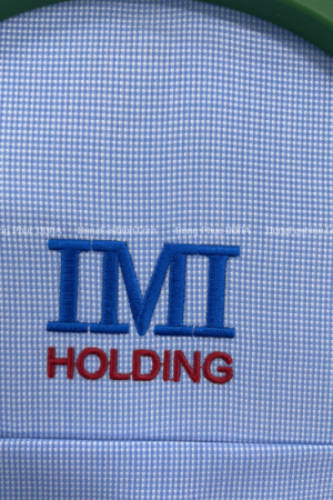 Thêu logo áo sơ mi đồng phục Thêu logo áo sơ mi đồng phục